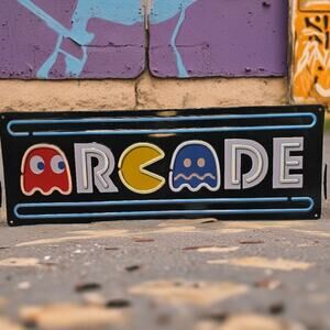 Open Road Brands Pac-Man Embossed Metal Arcade Sign 20x7 Retro Wall Art